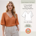 Woman wearing orange V Neck Bell Sleeve Top Sewing Pattern with beginner-friendly PDF instant download in sizes XS-XXXL